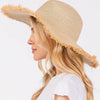 FRAYED EDGE FLOPPY STRAW HAT.