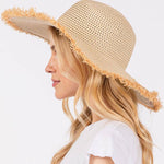 FRAYED EDGE FLOPPY STRAW HAT.