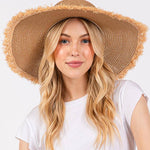FRAYED EDGE FLOPPY STRAW HAT.