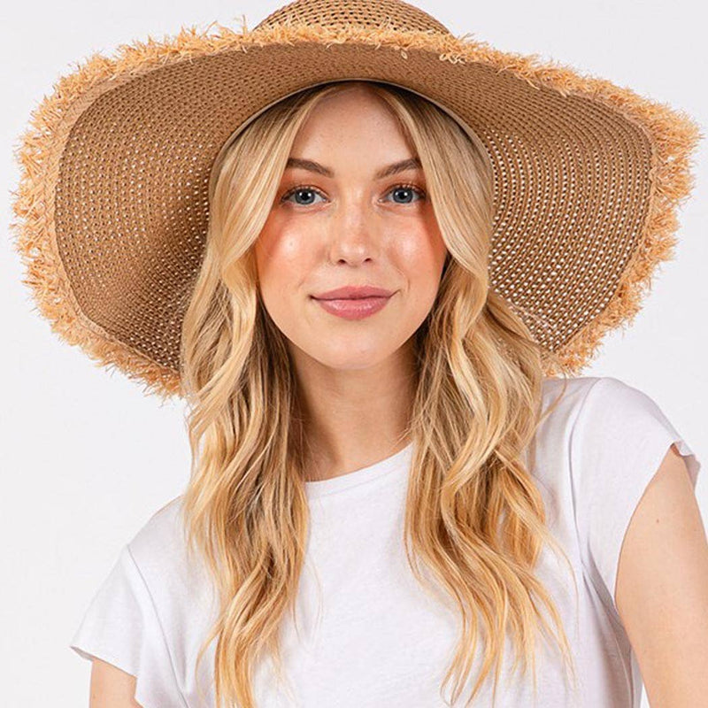 FRAYED EDGE FLOPPY STRAW HAT.