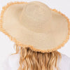 FRAYED EDGE FLOPPY STRAW HAT.