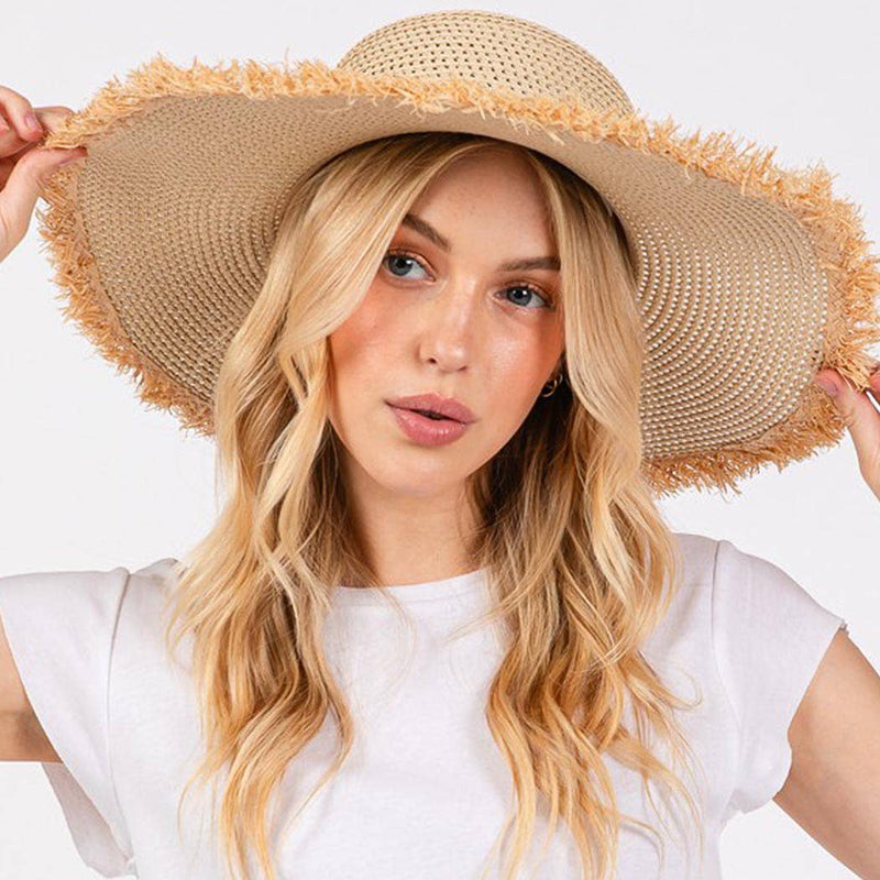 FRAYED EDGE FLOPPY STRAW HAT.