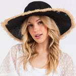 FRAYED EDGE FLOPPY STRAW HAT.